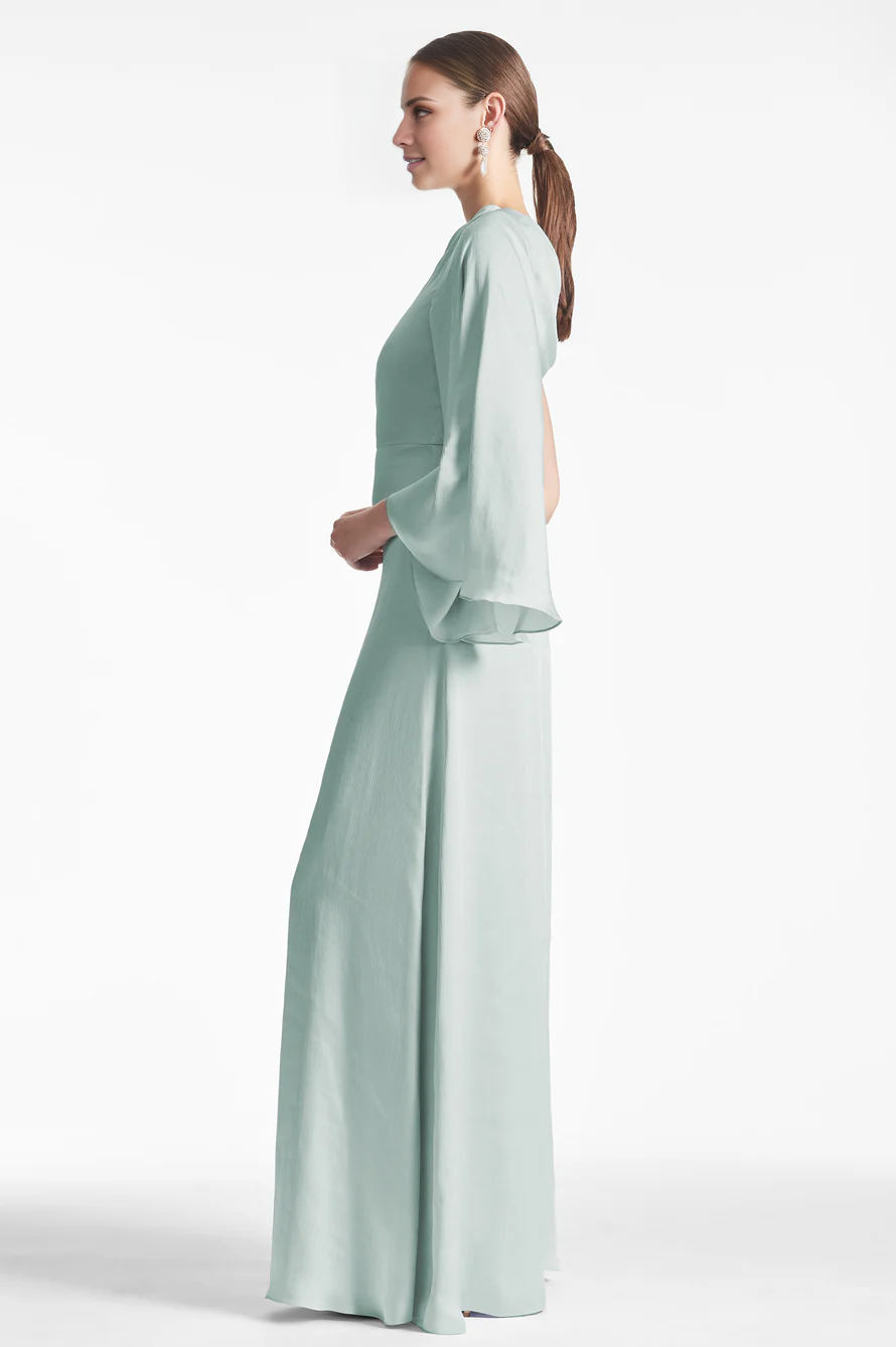 Jimiss asymmetrical neckline off shoulder long sleeved backless and floor length Prom dress